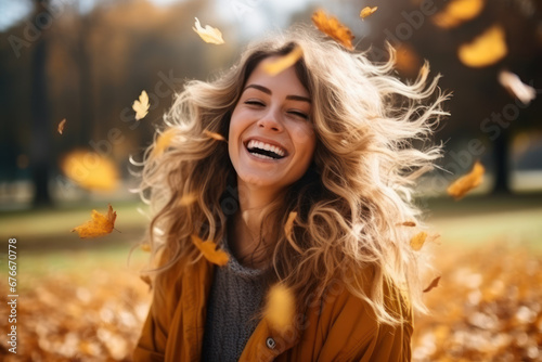 Joyful Woman in Autumn Leaves Fall