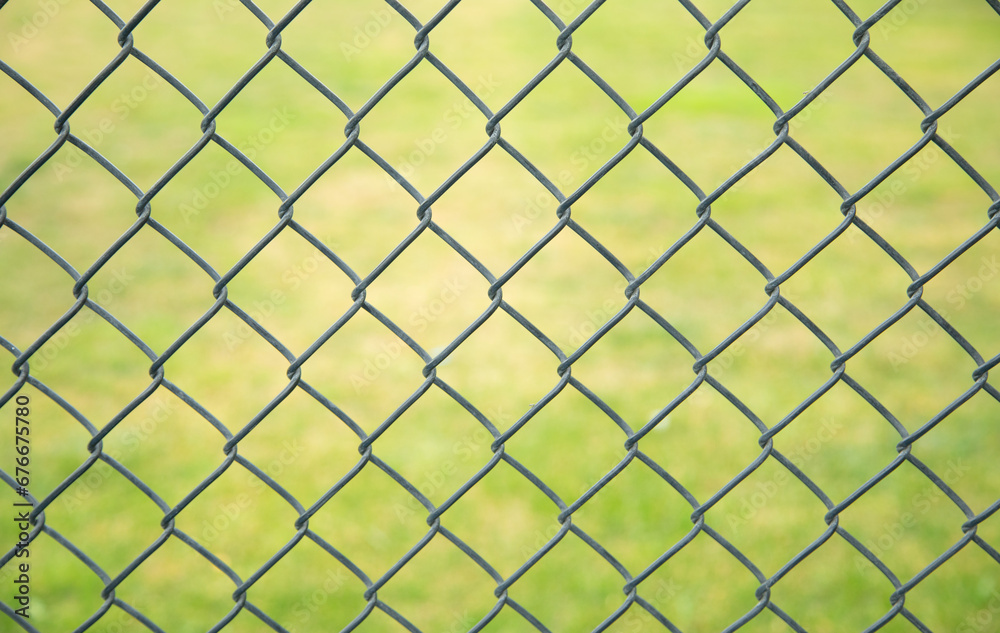 Chain link fence in outdoor background. Chain link fence in outdoor background.