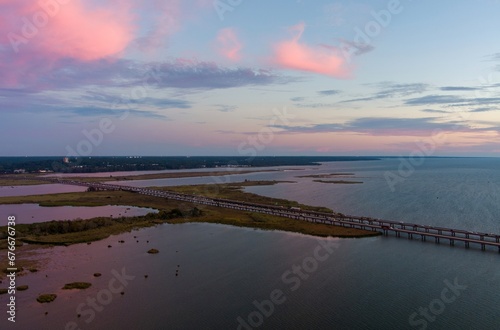 Eastern shore of Mobile Bay at sunset photo