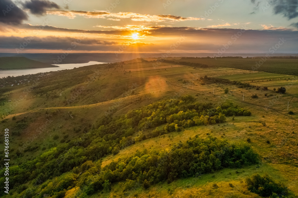 Aerial view, forests, mountains in Ukraine in summer, fog and dawn. Travel concept, weekend, vacation Aerial view, forests, mountains in Ukraine in summer, fog and dawn. Travel concept, weekend, vacation