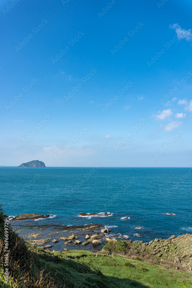 The landscape of Keelung Islet at Heping Island Park in Keelung City, Taiwan, Sky and sea horizon with copy space.