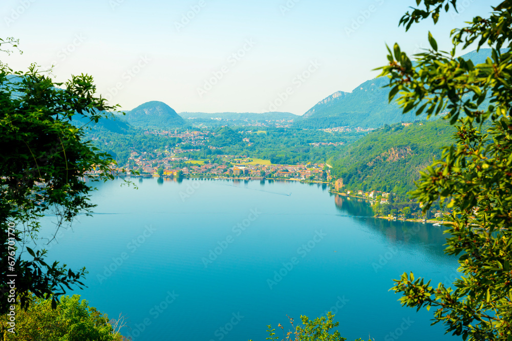 Naklejka premium Mountain View From Switzerland to Italy City Porto Ceresio and Lake Lugano in Morcote, Ticino, Switzerland.