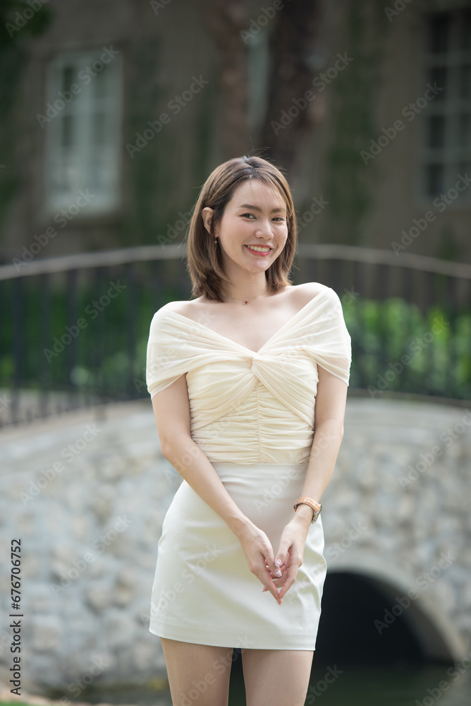 Portrait of young smiling woman looking at camera. happy girl standing in creative office. casual smiling laughing lifestyle of single female, natural look healthy skin and perfect teeth. Portrait of young smiling woman looking at camera. happy girl standing in creative office. casual smiling laughing lifestyle of single female, natural look healthy skin and perfect teeth.
