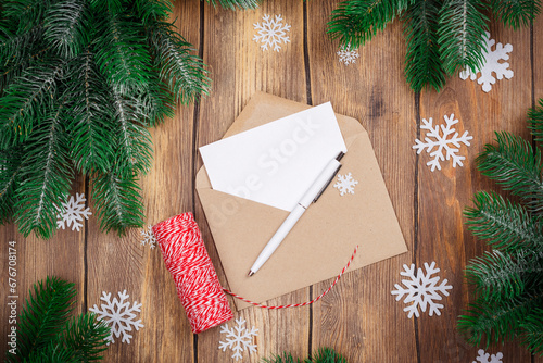 Santa's List Day. Letter to Santa background with empty card and envelope. Top view. Copy space photo