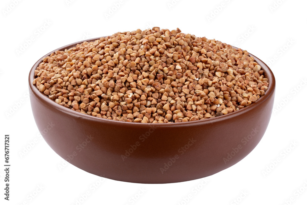 Green buckwheat grain in clay bowl isolated on white background. File contains clipping path. Green buckwheat grain in clay bowl isolated on white background. File contains clipping path.