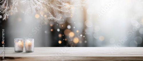 Side view of an empty white wooden table top with a gentle blurred soft light background. Bokeh effect. Christmas, holiday concept with candles