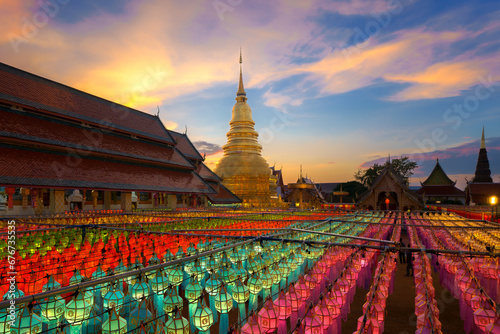 Lantern Festival or Yi Peng Festival in Hundred Thousand Lanterns is the big event of the popular Loi Krathong Festival at Wat  Phra That Hariphunchai Temple Lamphun a famous place Thailand, Asia. © pomphotothailand
