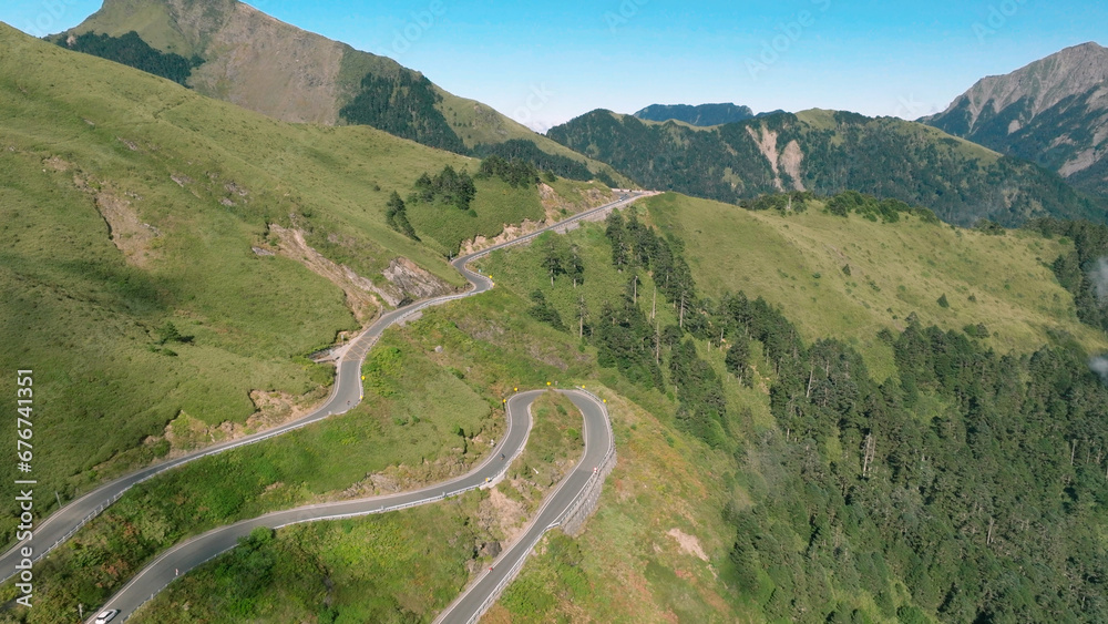 Aerial view of  country road with curved in the mountain