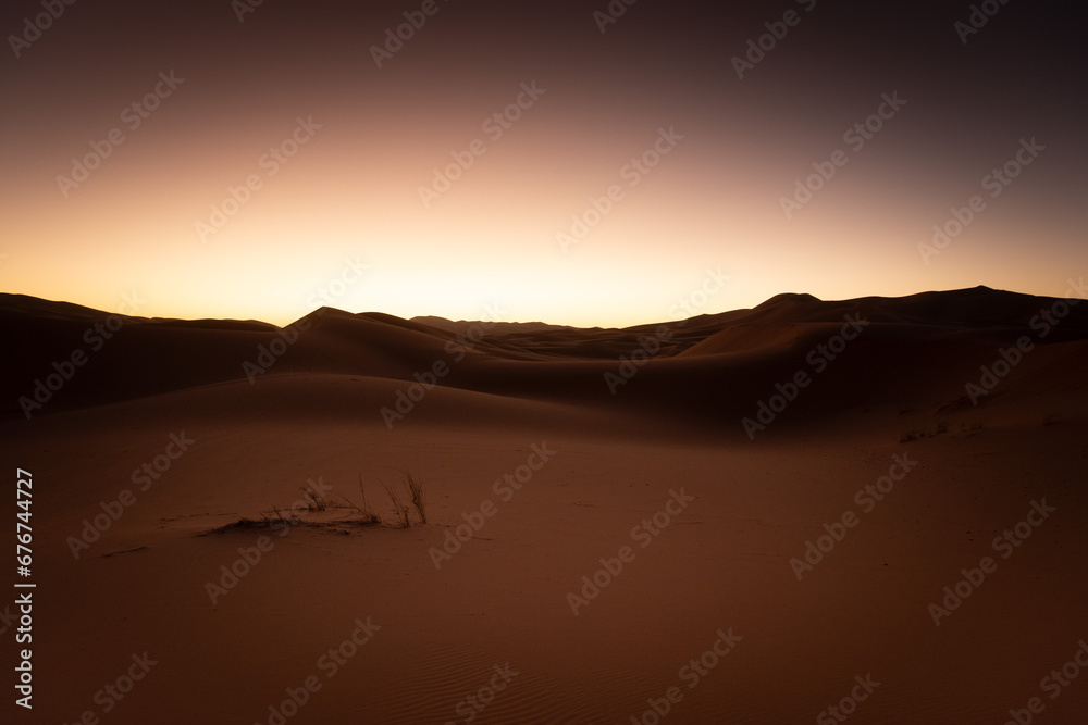 First minutes just before sunrise in the Merzouga desert.