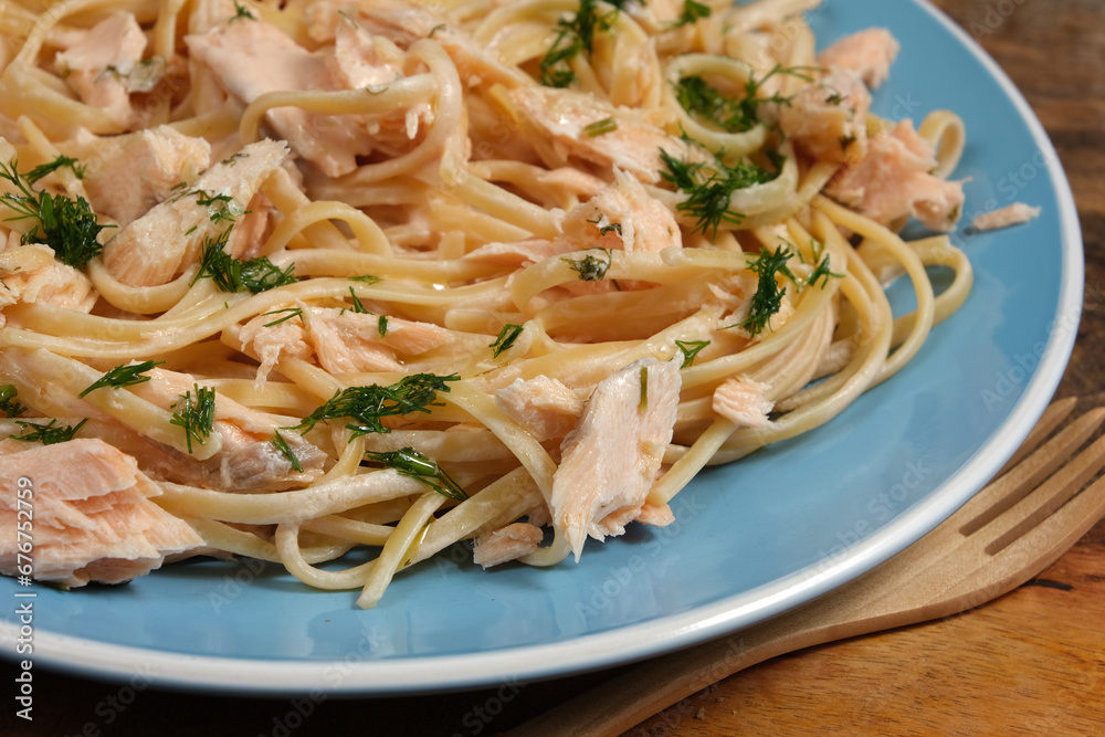 Creamy Salmon Pasta on ceramic plate. Creamy Salmon Pasta on ceramic plate.