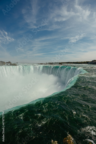 Fototapeta Naklejka Na Ścianę i Meble -  Niagara falls - Horseshoe Falls blue water and mist