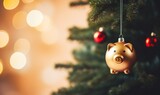 Piggy bank christmas decoration hanging on a Christmas tree branch. Seasonal savings and costs
