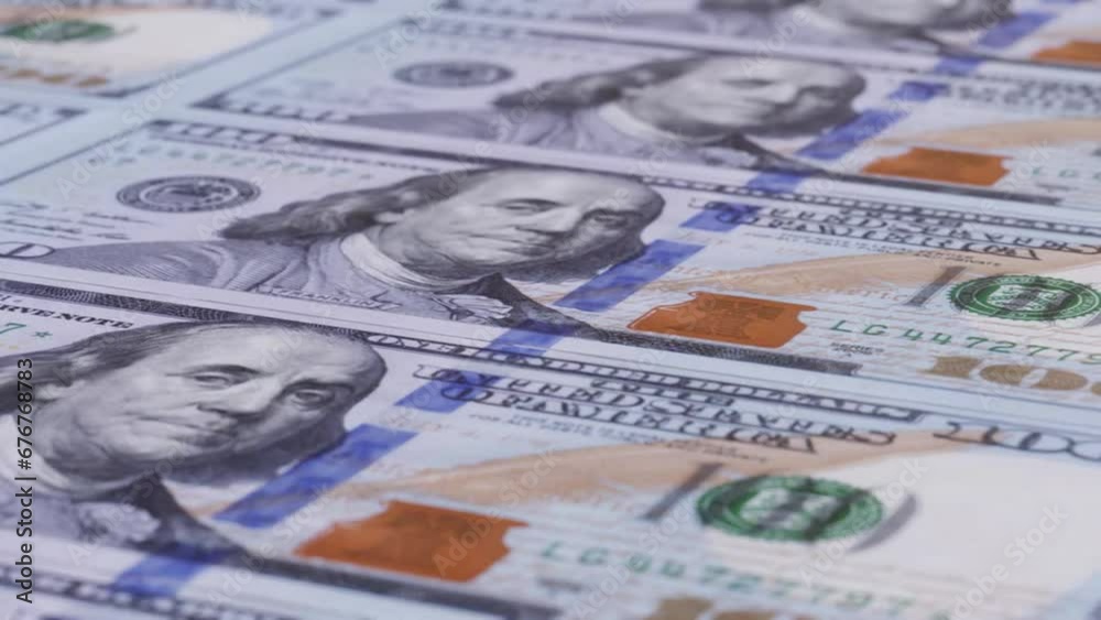 100 US Dollar Banknotes Loopable Background in 4K 60 fps stock video. Money printing animation. Economy, inflation and shopping concept. 100 US Dollar Banknotes Loopable Background in 4K 60 fps stock video. Money printing animation. Economy, inflation and shopping concept.