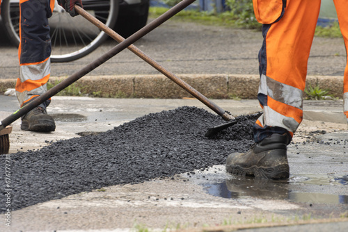 Repairing a broken road with new asphalt 