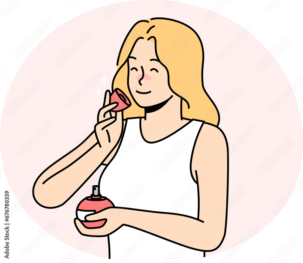 Smiling woman smelling perfume