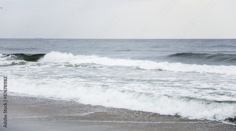 beach waves, a soothing symphony of nature's power and serenity, crashing on a sandy shore under a clear blue sky beach waves, a soothing symphony of nature's power and serenity, crashing on a sandy shore under a clear blue sky