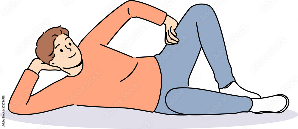 Obraz premium Man lies on floor with hand under head and with smile looks at screen, offering to relax and unwind