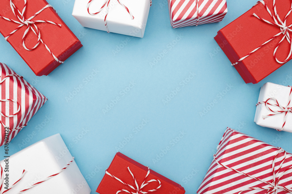 Fototapeta premium Gift boxes on color background, flat lay, space for text