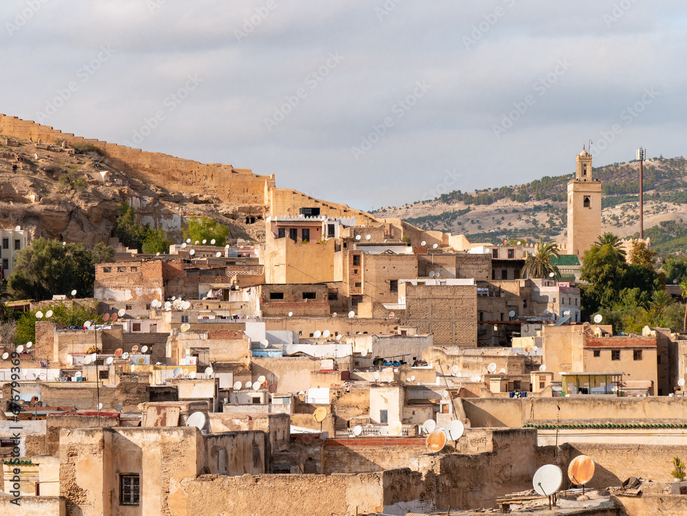 Dense neighborhood in Fes, Moroco, seen from a rooftop on a cloudy afternoon