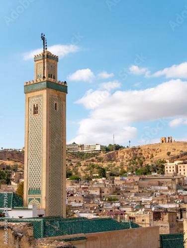 Moorish Mosque in Fes, Morocco, with the old town in the background photo