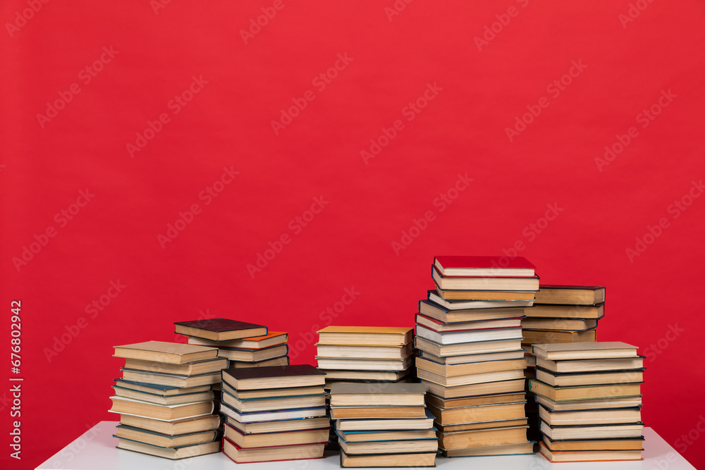 learning literacy science education stack of books on a green background learning literacy science education stack of books on a green background