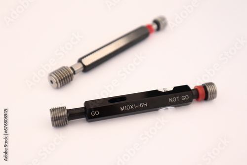 Fotografi Double threaded plug for thread inspection