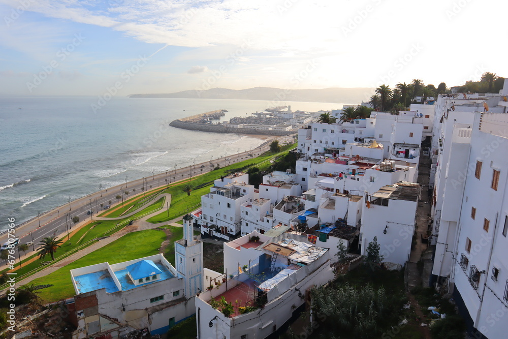 A panoramic view of the old city of Tangier with a view of the sea and the port