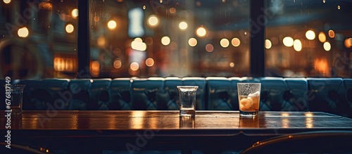 In a vintage style cafe the abstract background of soft bokeh lights enhances the warm and inviting interior creating a cozy ambiance for people to enjoy delicious food and conduct business  photo