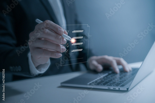 person planning the business plans and analyse  profitability of working companies with digital augmented reality graphics for project manager working on laptop and updating business plan