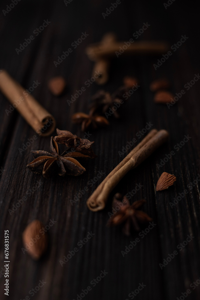 Cinnamon, star anise on wooden background and place for text Cinnamon, star anise on wooden background and place for text