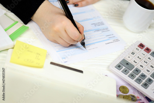 Accountant fill italian tax form F24 Unified payment model in end of tax period. Taxation and paperwork routine in Italy