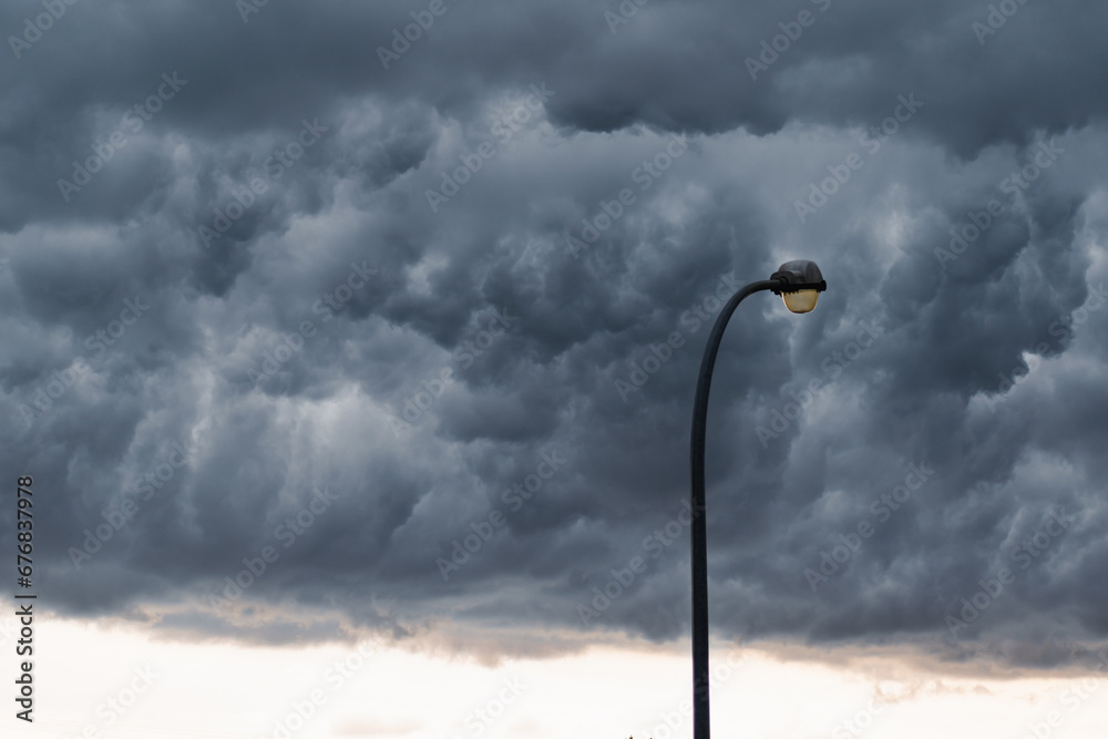 Majestic thundercloud by a stormy weather, dramatic dark scene Majestic thundercloud by a stormy weather, dramatic dark scene