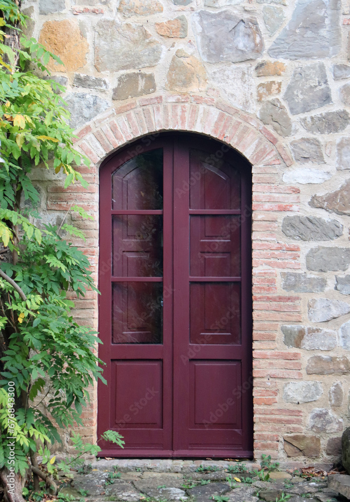 DETAIL OF AN ANCIENT HOUSE IN TUSCANY