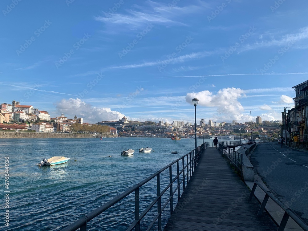 Walkway on the Douro river on a sunny bright day in Porto, Portugal