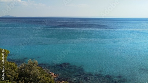 Fototapeta Naklejka Na Ścianę i Meble -  Scenic shot of a vast turquoise sea water across the horizon