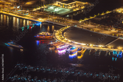 Dubai Harbour in Marina region with Yachts and Boats at night