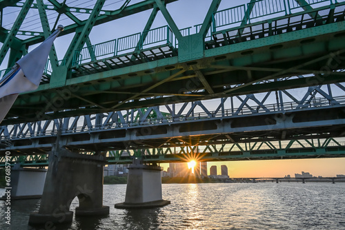 Photography Beautiful sunset over the city at Han River, Seoul.
