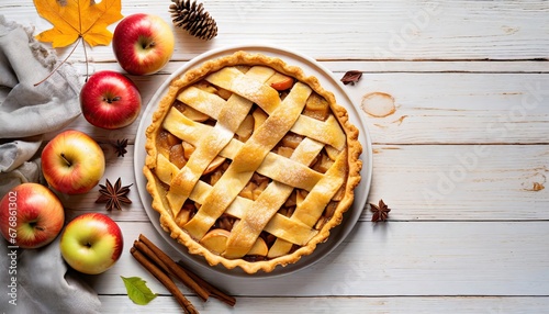 Apple pie on white wood plank table, flat lay with copyspace, top view, fall food, Thanksgiving cooking