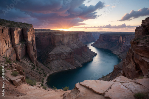 A sunset view of the canyon with water.