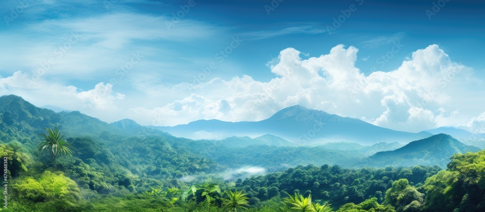 Fototapeta premium In the background of the vibrant blue sky I embarked on a magical travel journey surrounded by breathtaking nature towering trees and mesmerizing landscapes of lush forests Fluffy white clou