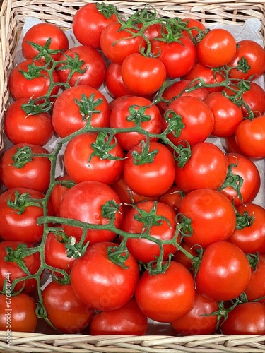 Tomatoes red ripe fruits.