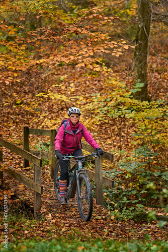 nice senior woman riding he...