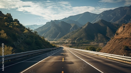 Photography of an Empty Highway on a Mountain © Fadil