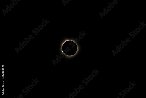 nightscape, night full of stars, hybrid solar eclipse, Exmouth, Australia, 20.04.2023, small part of the corona of our sun with also visible some solar flares and solar mass ejections