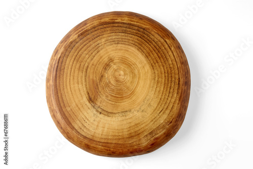 Brown wooden round board podium isolated on white background. Top view with copy space