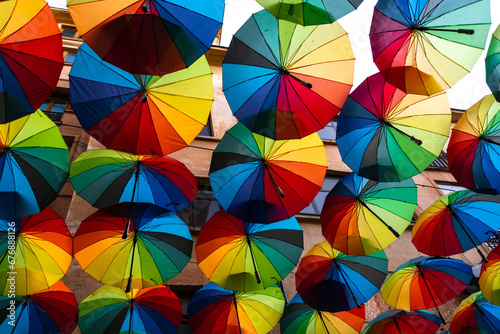 Colorful umbrellas in the sky - Victoriei passage in Bucharest city centre, Romania  photo