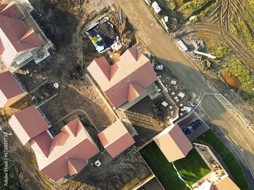 Fototapeta Drone top down view of private and affordable housing in development in East Anglia, UK