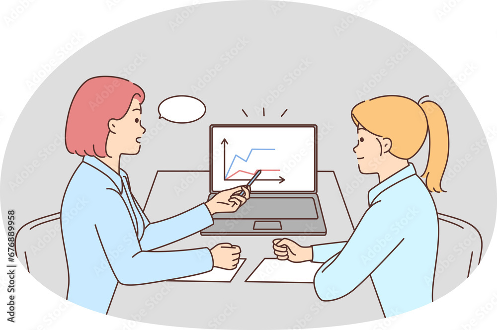 Businesswomen discuss financial graphs in office Businesswomen discuss financial graphs in office