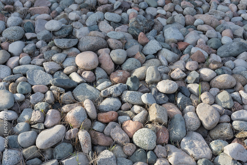 stones and cobblestones of different sizs, top of view. photo
