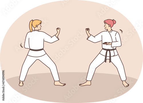 Women practice martial arts